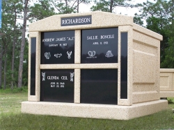 Four-space deluxe mausoleum with granite inlays in the columns in South Port, FL