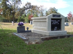 Single deluxe mausoleum with fluted columns in Sumrall, MS