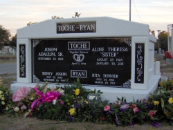 Side-by-side deluxe white mausoleum with engraved granite inlays in the columns in Biloxi, MS