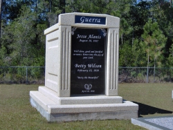 Over-and-under (stack) deluxe mausoleum with fluted columns, step-up trim pieces on a foundation/slab in Vancleave, MS