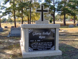 Single basic mausoleum with a cross in Rockingham, NC