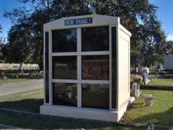 Six-space tall mausoleum with granite inlays in the columns in Biloxi, MS