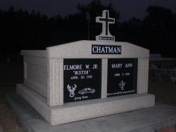 Side-by-side deluxe mausoleum with fluted columns and a cross on a foundation/slab in Bay St. Louis, MS