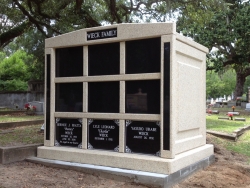 Nine-space mausoleum with granite inlays in the columns on a foundation/slab in Biloxi, MS