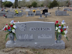 Double upright headstone with two turned vases on a base