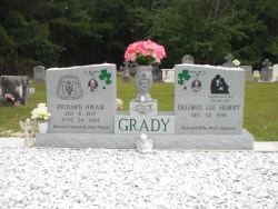 Double upright headstone with one turned vase on a base in Biloxi, MS