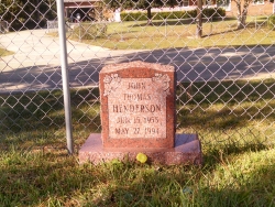 Single upright headstone made of morning rose granite in Saucier, MS