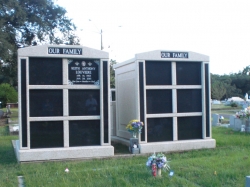 Six-space tall mausoleum with granite inlays in the columns in Biloxi, MS