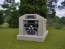 Single deluxe mausoleum with fluted columns in Lumber Bridge, NC