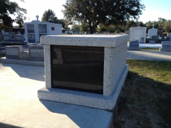 Single basic light gray mausoleum in Bay St. Louis, MS