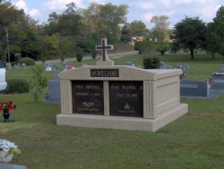 Side-by-side deluxe mausoleum with cross and fluted columns