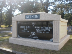 Side-by-side deluxe white mausoleum with fluted columns in Pascagoula, MS