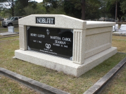 Side-by-side deluxe white mausoleum with fluted columns in Pascagoula, MS