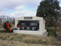 Side-by-side deluxe mausoleum with fluted columns in Lyons, MS